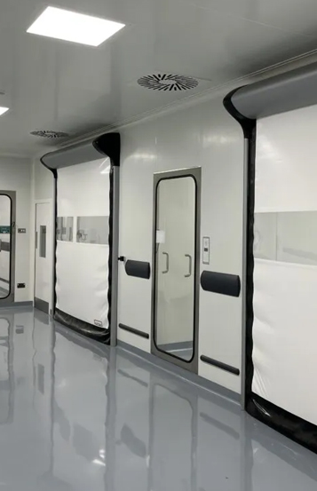 Cleanroom interior with observation window, sealed entry door and reflective epoxy flooring
